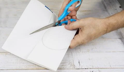 Step by step how to make heart from red satin textile. Valentine's day concep Stock Photos