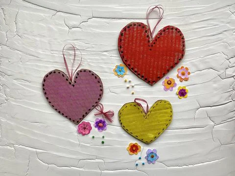 Step by step, how to make a heart from simple materials, a heart with flowers. Stock Photos