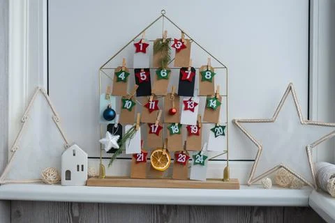 Step by step instruction of making handmade Christmas advent calendar. Creative Stock Photos