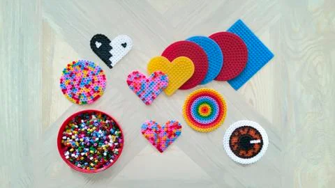 Step-by-step instruction for thermo mosaic: step 1.Forms,container,beads Stock Photos