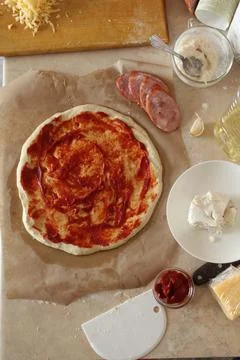Step-by-step instructions for cooking pizza. Step 1. Roll the dough onto the Stock Photos