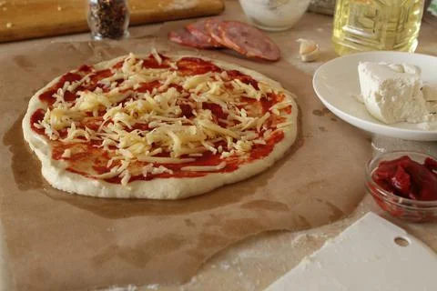 Step-by-step instructions for cooking pizza. Step 2. on the basis for pizza w Stock Photos