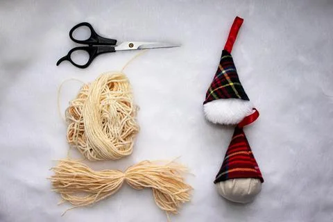 Step by step instructions for creating two Christmas tree decorations Stock Photos