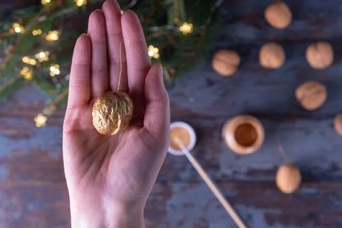 Step-by-step instructions: DIY golden nut tree toy. Step 12: The resulting be 写真素材