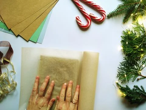 Step-by-step instructions for packing a Christmas gift. DIY gift wrapping Stock Photos