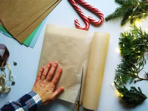 Step-by-step instructions for packing a Christmas gift. DIY gift wrapping Stock Photos