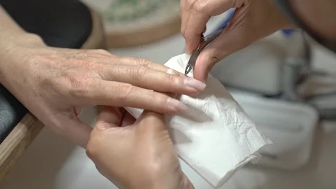 Step by Step Manicure Process Featuring Classic French Design in Pastels Stockbeeldmateriaal 323095068