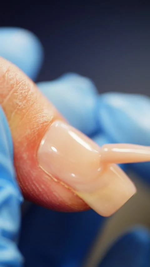 Step-by-step manicure process with shaping buffing and gel application Stock Footage 322131425