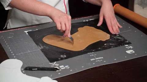 Step-by-step master class on making Christmas cake, pierces the dough with fork Stock Footage 166527471
