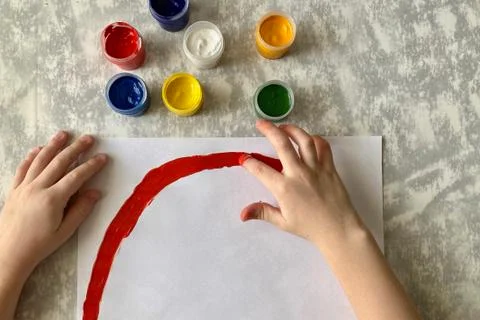 Step by step, master class in paint drawing, Children's drawing rainbow. Stock Photos