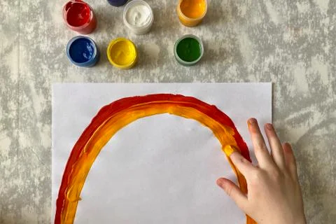 Step by step, master class in paint drawing, Children's drawing rainbow. Stock Photos