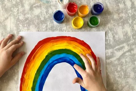 Step by step, master class in paint drawing, Children's drawing rainbow. Stock Photos