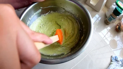 Step by step mixing those baking ingredient on a bowl and mixing using hand Stock Footage 109405737