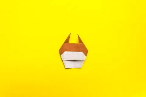 Step by step photo instruction how to make origami paper bull. The bull is th Stock Photos