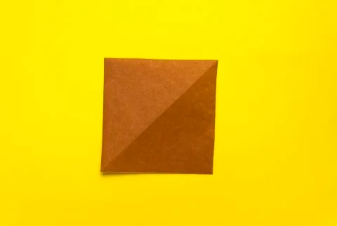 Step by step photo instruction how to make origami paper bull. The bull is th Stock Photos