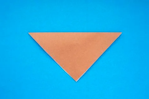 Step by step photo instruction how to make origami paper dog. Simple diy kids Stock Photos