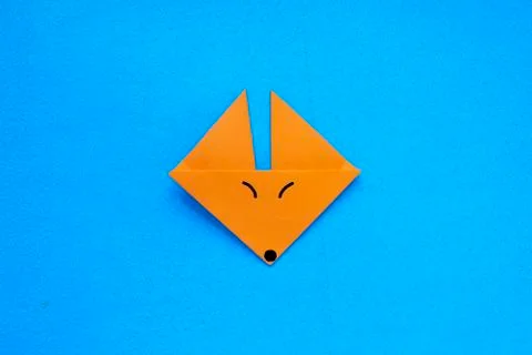 Step by step photo instruction how to make origami paper fox. Simple diy with Stock Photos
