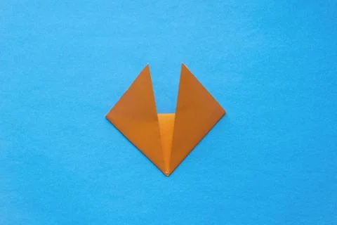 Step by step photo instruction how to make origami paper fox. Simple diy with Stock Photos