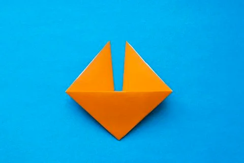 Step by step photo instruction how to make origami paper fox. Simple diy with Stock Photos