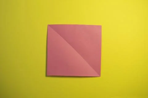 Step by step photo instruction how to make origami paper pig. Simple diy ki.. Stock Photos