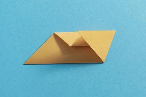 Step by step photo instruction how to make origami paper kitty. Simple diy kids Stock Photos