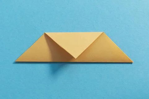 Step by step photo instruction how to make origami paper kitty. Simple diy kids Stock Photos