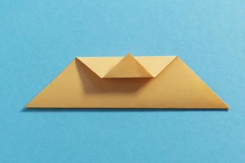Step by step photo instruction how to make origami paper kitty. Simple diy kids Stock Photos