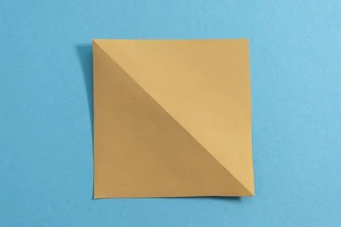Step by step photo instruction how to make origami paper kitty. Simple diy kids Stock Photos