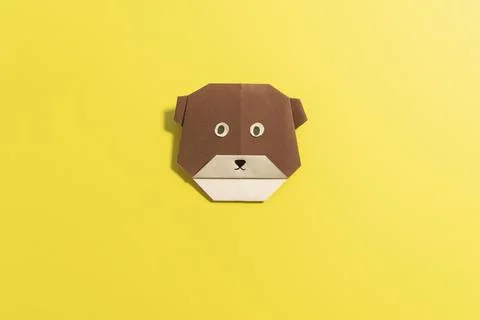 Step by step photo instruction how to make origami paper bear. Simple diy kids Stock Photos