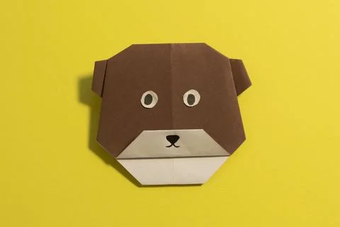 Step by step photo instruction how to make origami paper bear. Simple diy kids Stock Photos