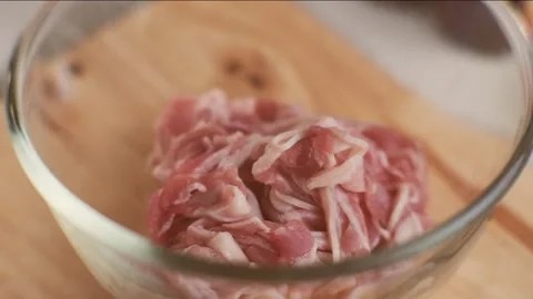 Step-by-step procedures for marinating pork for easy Korean cooking. Stock Footage 242549955