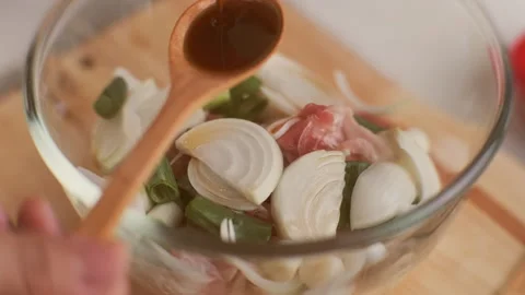 Step-by-step procedures for marinating pork for easy Korean cooking. Stock Footage 242550108