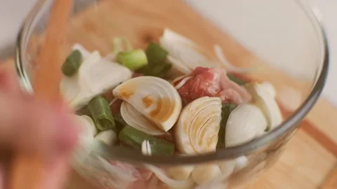 Step-by-step procedures for marinating pork for easy Korean cooking. Stock Footage 242550129