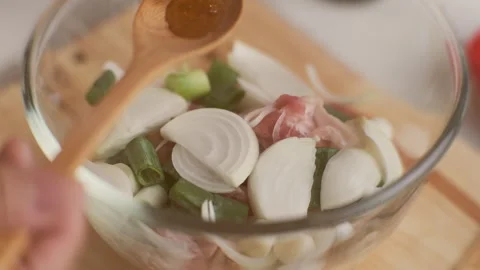 Step-by-step procedures for marinating pork for easy Korean cooking. Stock Footage 242550146