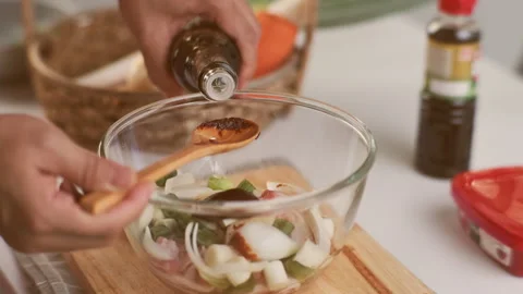 Step-by-step procedures for marinating pork for easy Korean cooking. Stock Footage 242550479