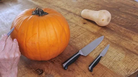 Step-by-step process of carving pumpkin into jack-o’-lantern for Halloween Stock Footage 316822393