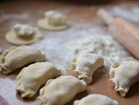 Step-by-step process of creating a home with cottage cheese dumplings. Фото