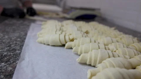 Step by step process of croissant preparation.frozen croissants Stock Footage 274124984