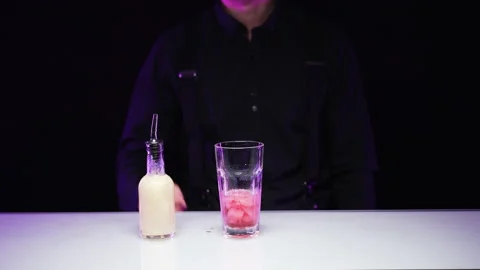 Step-by-step recipe for making an alcoholic cocktail Stock Footage 168833229