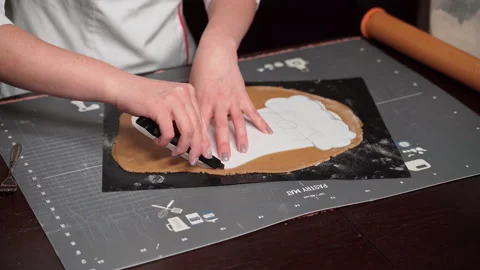 Step-by-step recipe for making Christmas cake shape of Santa Claus's boot Stock Footage 166522353