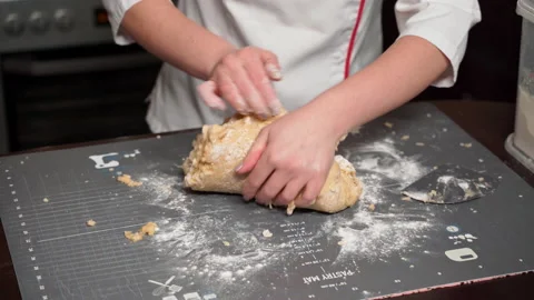 Step-by-step recipe for making open honey cake. Kneads shortbread dough Stock Footage 166438072