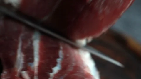 Step-by-step recipe for pork knuckle roll, female cook separates meat from bone Stock Footage 125838165