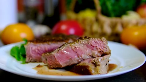 Step by step ribeye steak recipe with garlic butter cooked on stainless steel Video stock 346185596