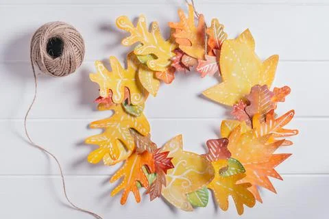 Step-by-step tutorial autumn paper wreath. Step 5: wreath is ready. Add ribbo Stock Photos