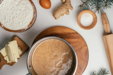 Step-by-step tutorial on baking Christmas gingerbread cookies. Step 3: Stirri Stock Photos
