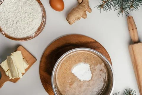 Step-by-step tutorial on baking Christmas gingerbread cookies. Step 4: Add ba Stock Photos