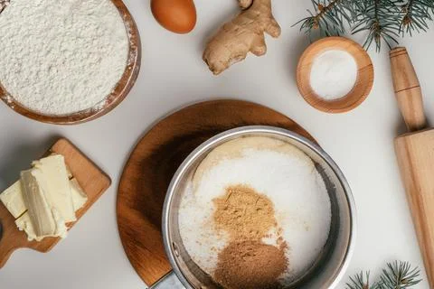 Step-by-step tutorial on Christmas gingerbread cookies. Step 2: Put honey, su 写真素材
