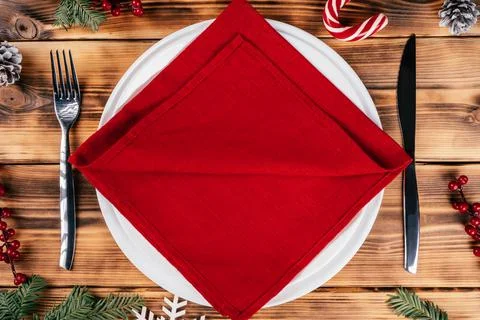 Step-by-step tutorial: Fold linen napkin in shape of Christmas tree. Step 2:  Stock Photos