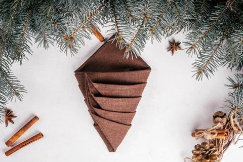 Step-by-step tutorial: Fold linen napkin in shape of Christmas tree. New Year Stock Photos