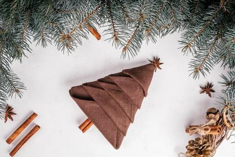 Step-by-step tutorial: Fold napkin in shape of Christmas tree. Step 10: Add a Stock Photos